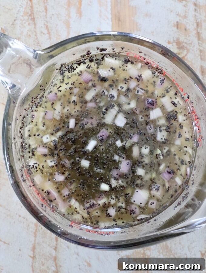 Homemade Creamy Poppy Seed Salad Dressing 5 poppy seed dressing in glass mixing bowl