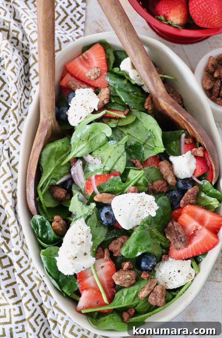 Homemade Creamy Poppy Seed Salad Dressing 6 large salad in serving bowl topped with dollops of ricotta cheese and sliced strawberries