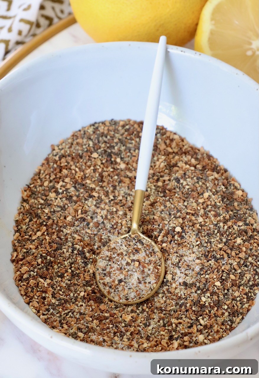 lemon pepper seasoning in bowl with spoon