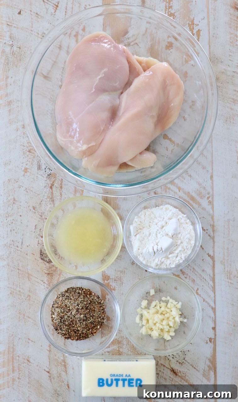 Crispy Lemon Pepper Chicken Recipe with Garlic Butter 3 ingredients for lemon pepper chicken on white wood board