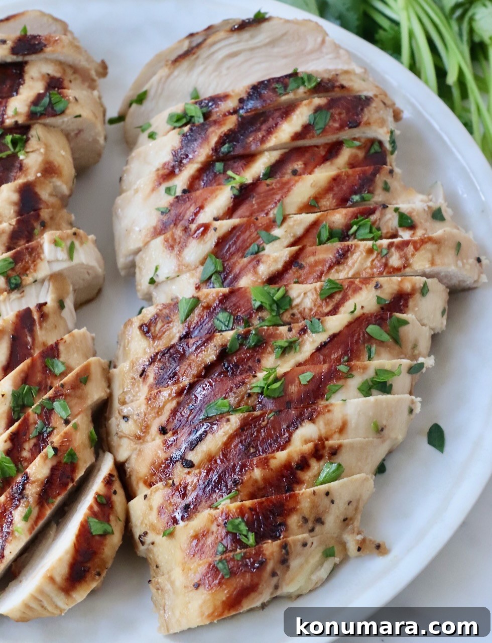 Garlic Lemon Chicken Marinade for Juicy Grilled Chicken 7 sliced grilled chicken on plate