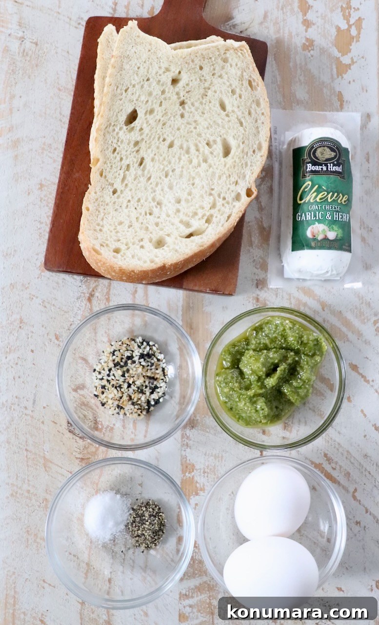Creamy Pesto Scrambled Eggs with Parmesan 5 ingredients for pesto eggs on white wood board