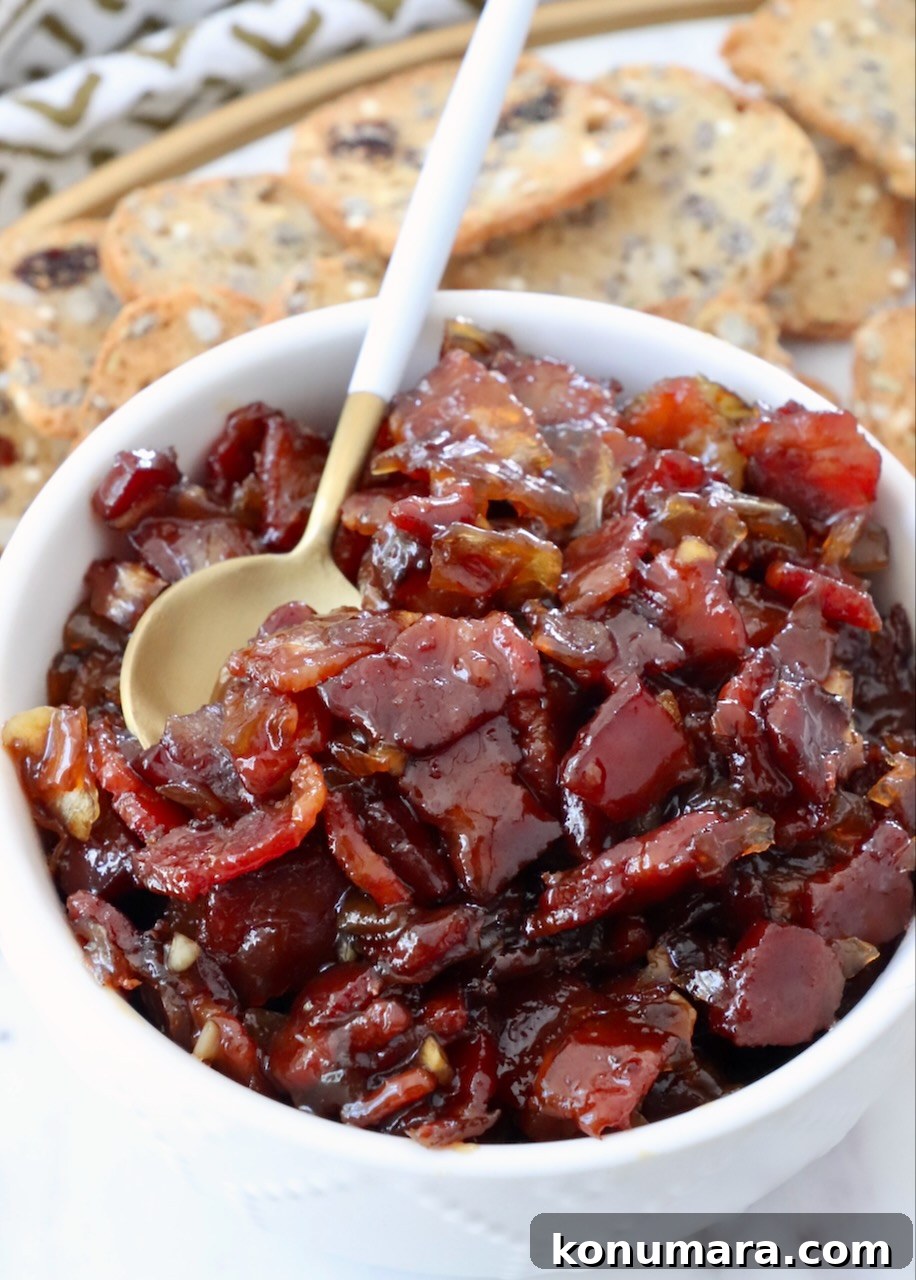 Bacon jam served in a bowl with a spoon