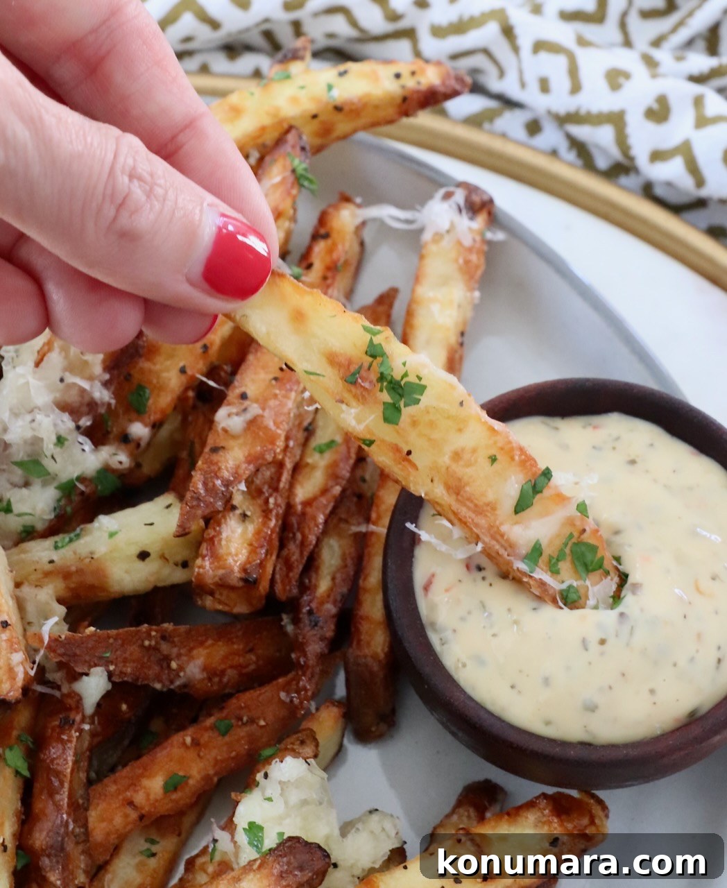 Crispy Truffle Fries with Garlic and Parmesan 9 fry dipped into garlic parmesan sauce