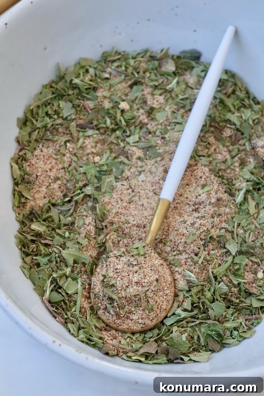Vegetable Seasoning: Herb and Spice Blend for Roasting 4 Vegetable seasoning mixed together in a bowl with a spoon