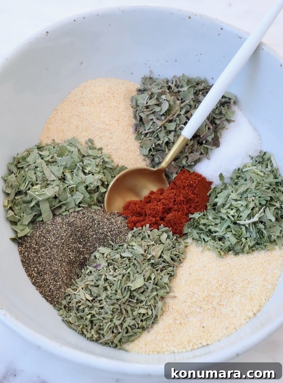 Vegetable Seasoning: Herb and Spice Blend for Roasting 5 Dried herbs and spices separated in bowl with spoon