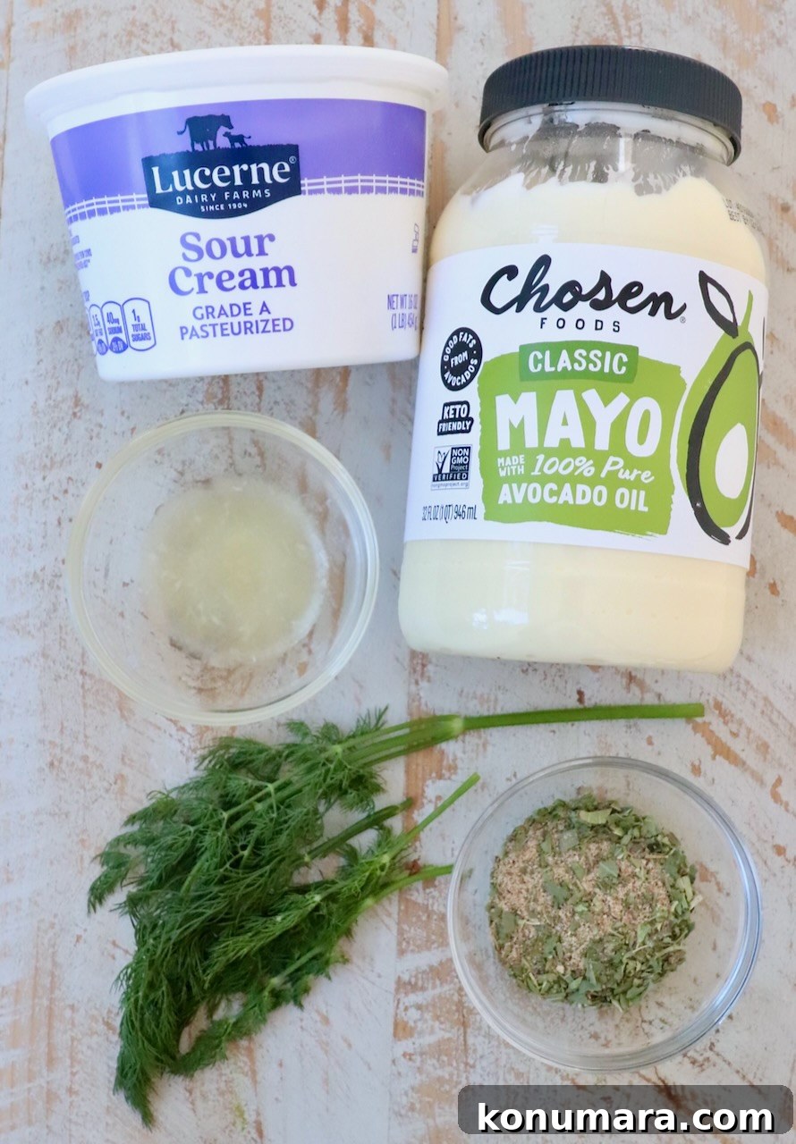 ingredients for vegetable dip on white wood board