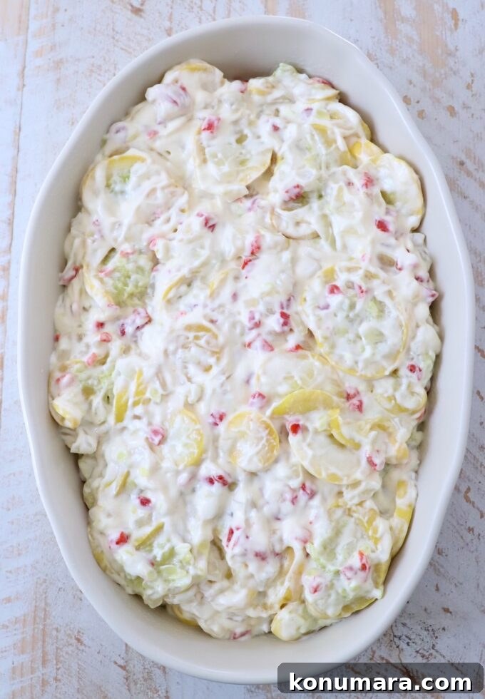creamy squash mixture in a casserole dish