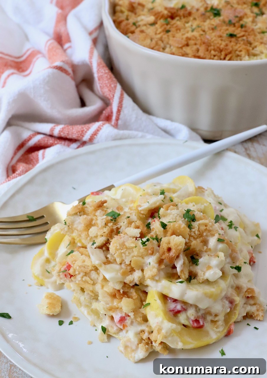 squash casserole on plate with fork