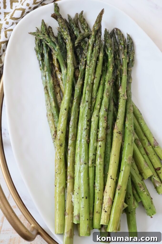 How to Cook Asparagus: Roasted, Grilled, Steamed and Sauteed 8 roasted asparagus spears on plate