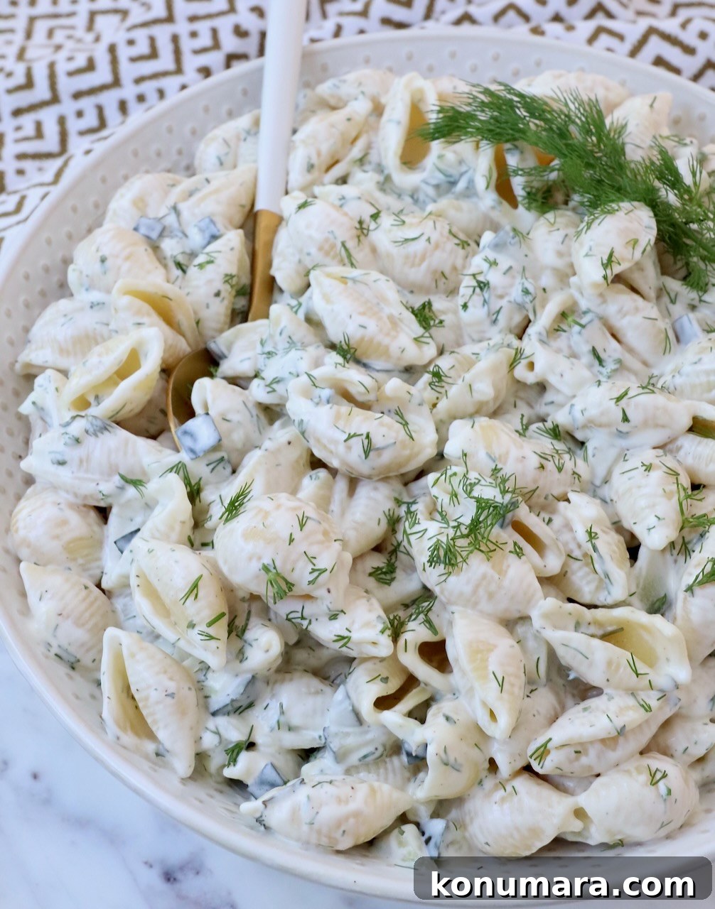 Creamy Tangy Pickle Pasta Salad 6 creamy pickle pasta salad in bowl with spoon