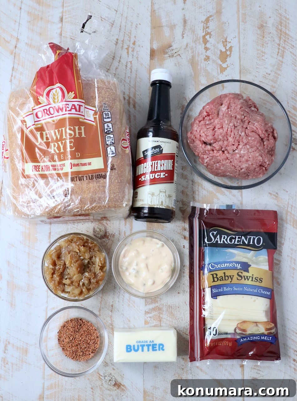 Classic Patty Melt Recipe with Caramelized Onions 3 ingredients for patty melt on white wood board