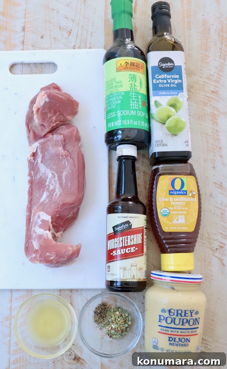 Savory Pork Tenderloin Marinade for Tender, Juicy Meat 3 ingredients for pork tenderloin marinade on white wood board