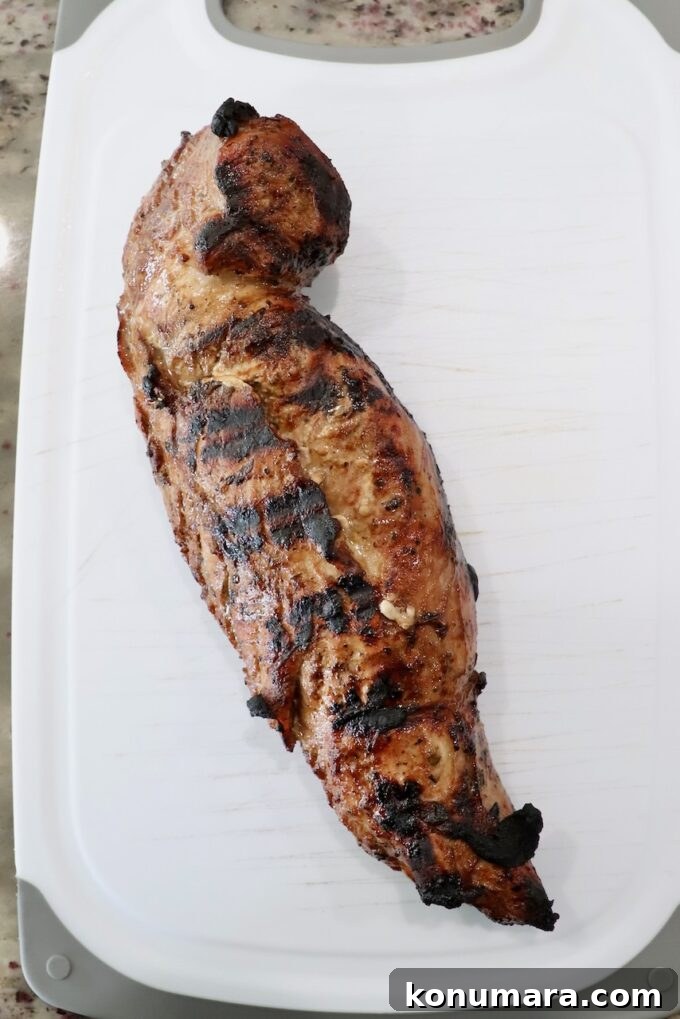 Savory Pork Tenderloin Marinade for Tender, Juicy Meat 7 grilled pork tenderloin on cutting board