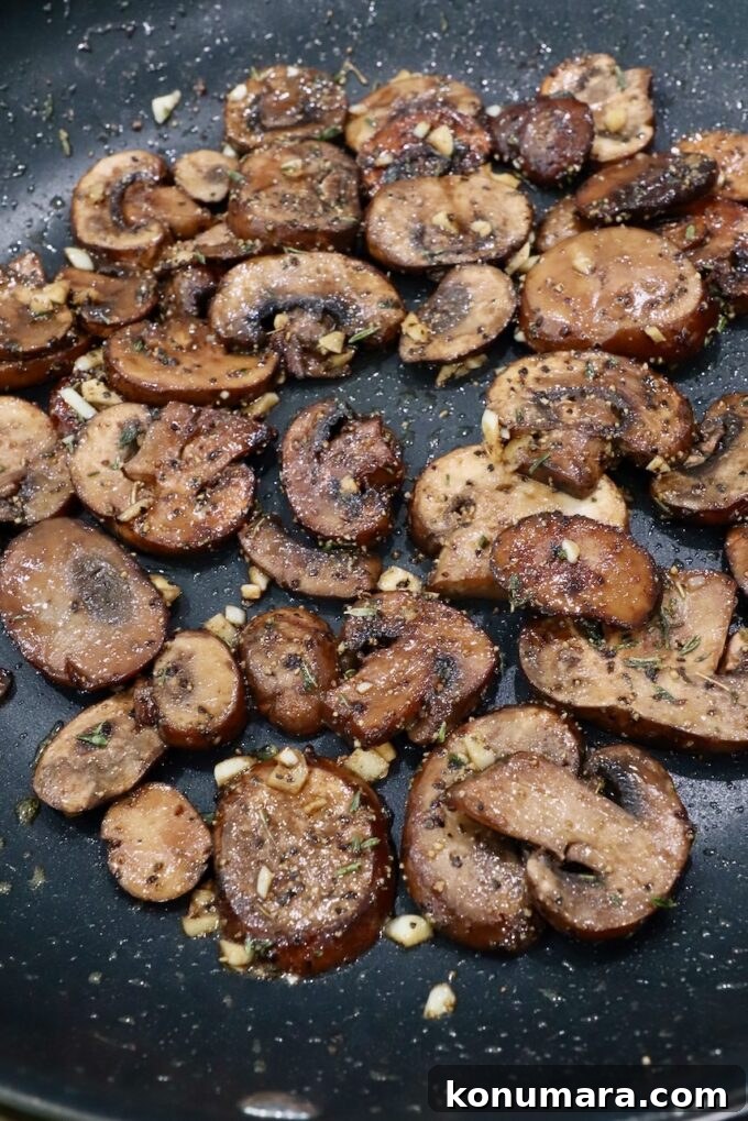 sauteed mushrooms in a skillet