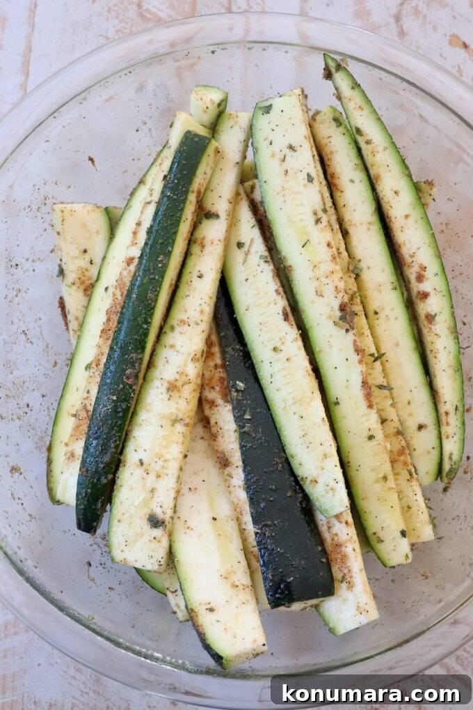 How to Cook Zucchini: Roast, Saute, Grill, Stir-Fry 3 seasoned zucchini spears in large glass bowl