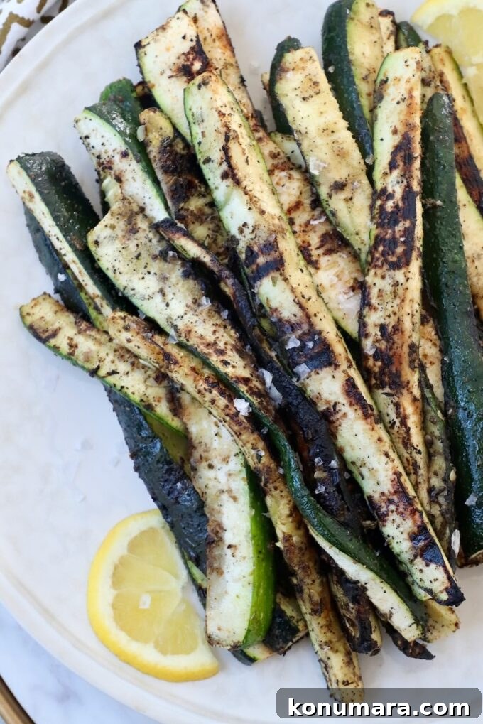 How to Cook Zucchini: Roast, Saute, Grill, Stir-Fry 5 grilled zucchini spears on plate