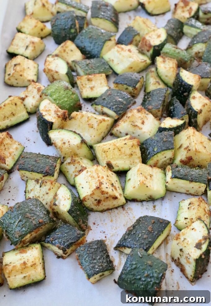 How to Cook Zucchini: Roast, Saute, Grill, Stir-Fry 8 cooked diced zucchini on parchment lined baking sheet