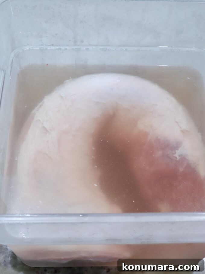 How to Smoke Pork Loin for Tender, Juicy Results 4 pork loin in salt brine in large plastic tub
