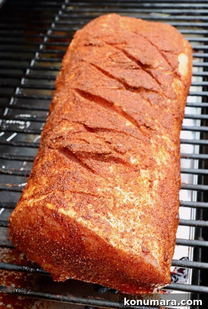 How to Smoke Pork Loin for Tender, Juicy Results 5 seasoned pork loin on smoker