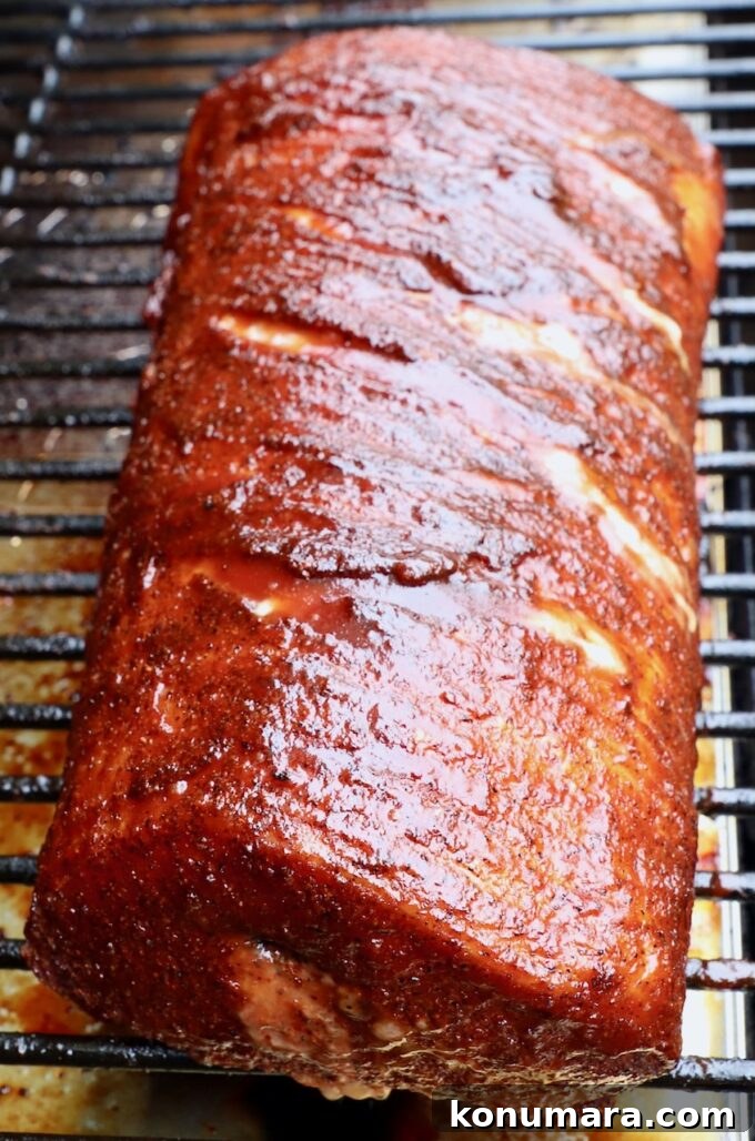 How to Smoke Pork Loin for Tender, Juicy Results 8 bbq glazed pork loin on smoker