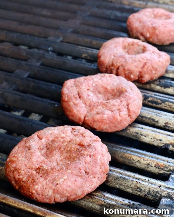 burger patties on a grill