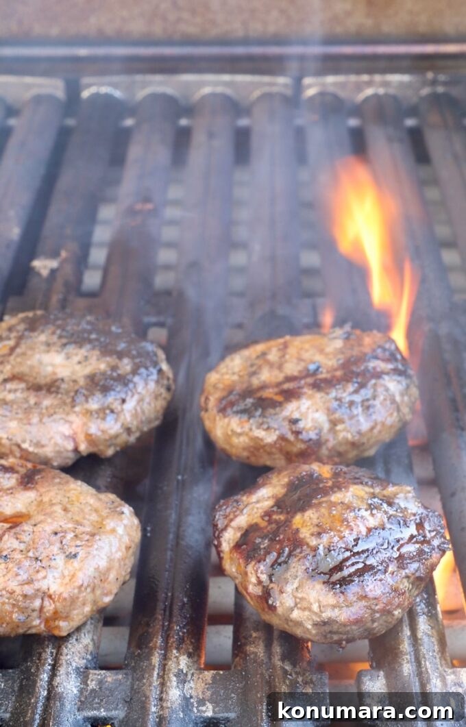grilled burger patties on grill