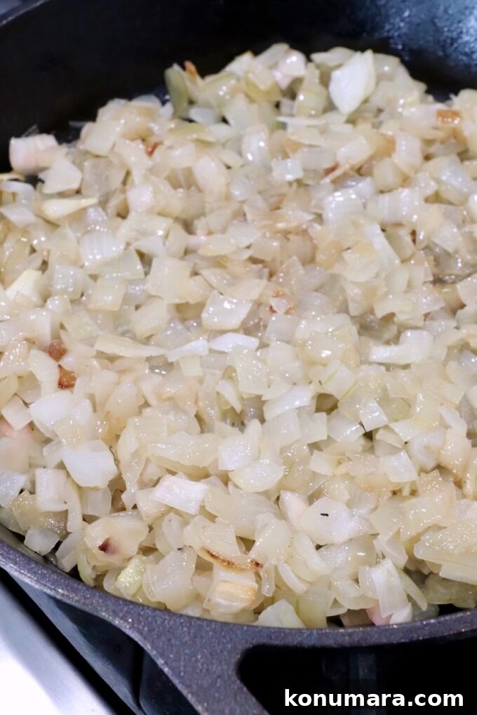 smoked caramelized diced onions in a cast iron skillet