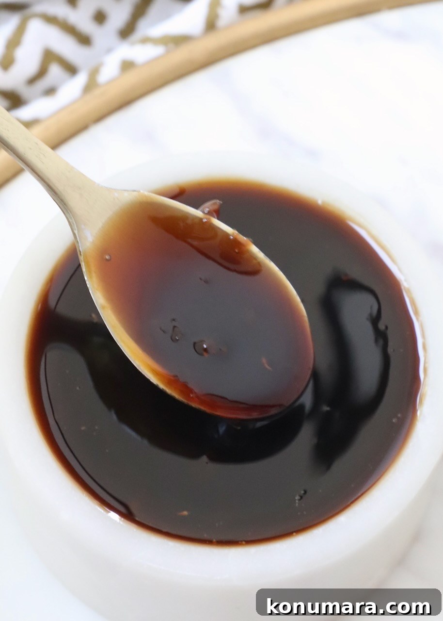 teriyaki sauce in a small bowl with a small spoon