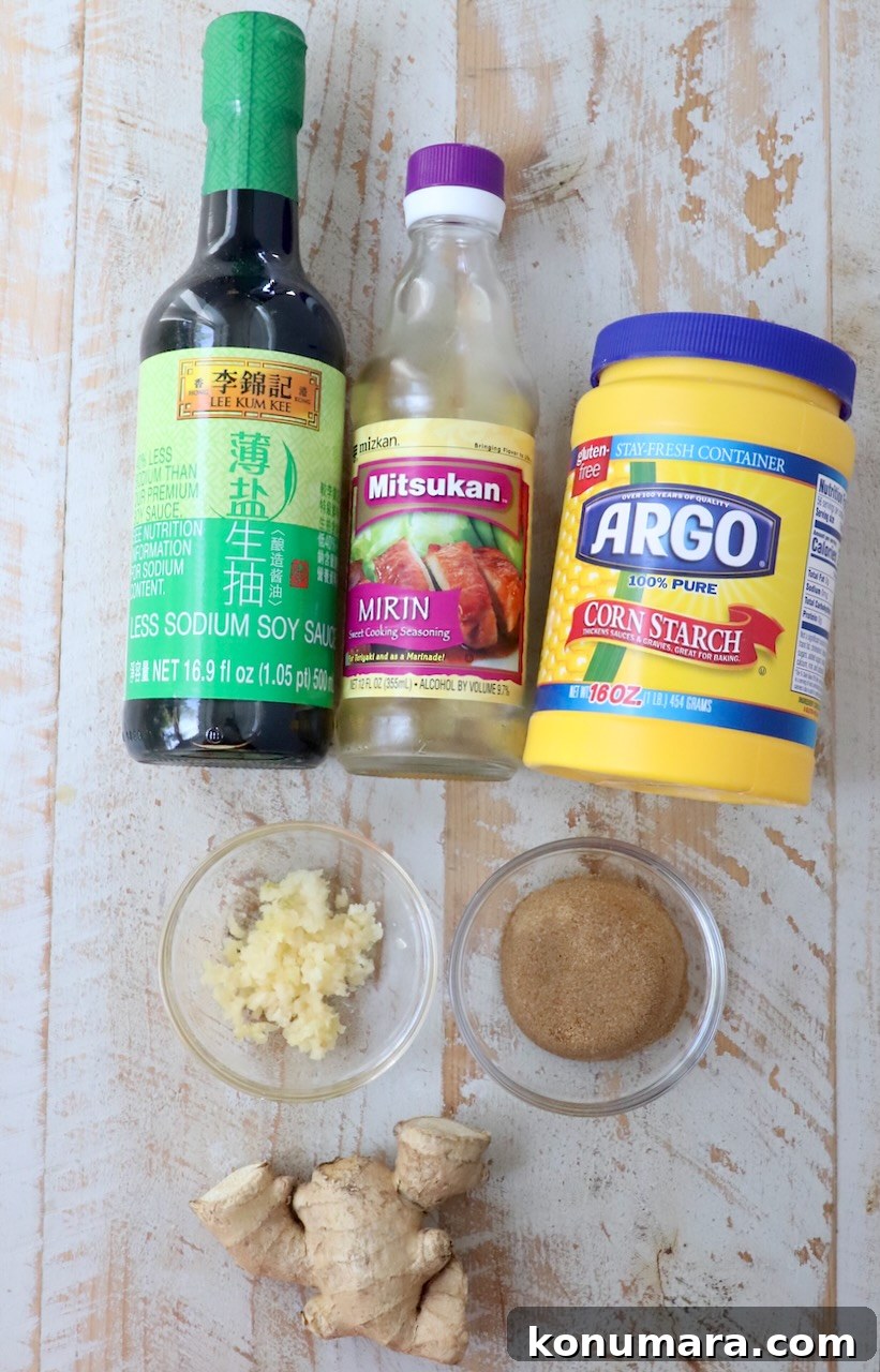 ingredients for teriyaki sauce on a white wood board