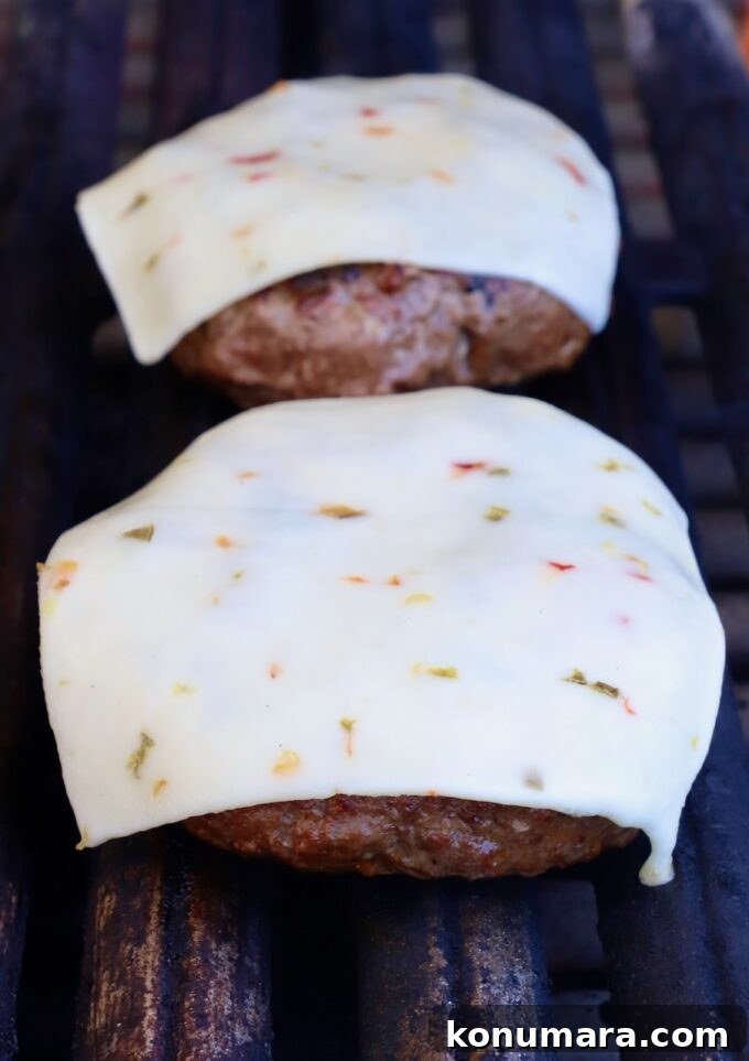Hawaiian Burger with Grilled Pineapple and Teriyaki Sauce 7 cheeseburgers on the grill