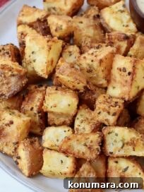seasoned roasted cubed potatoes on plate