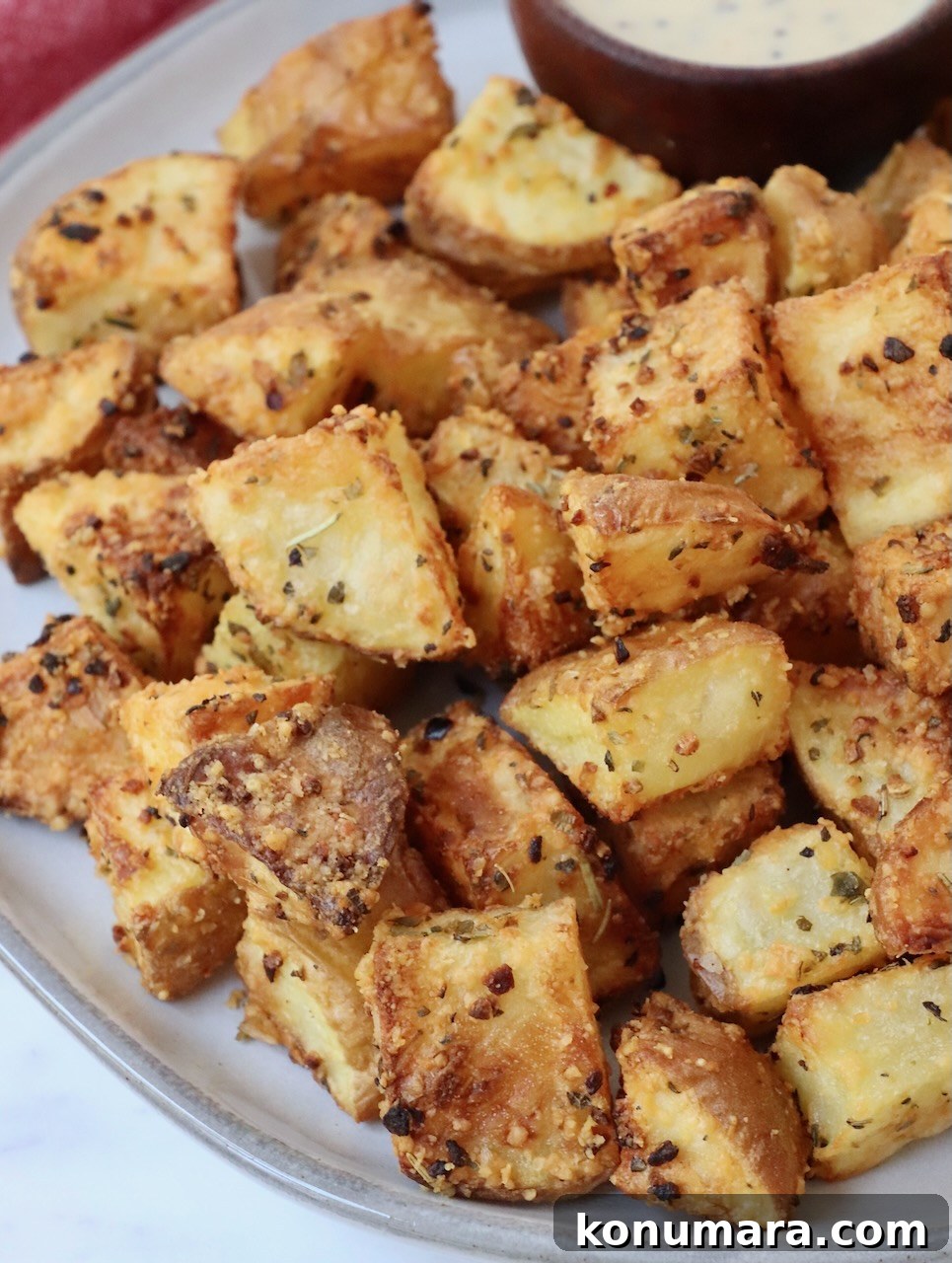 cubed roasted and seasoned potatoes on plate