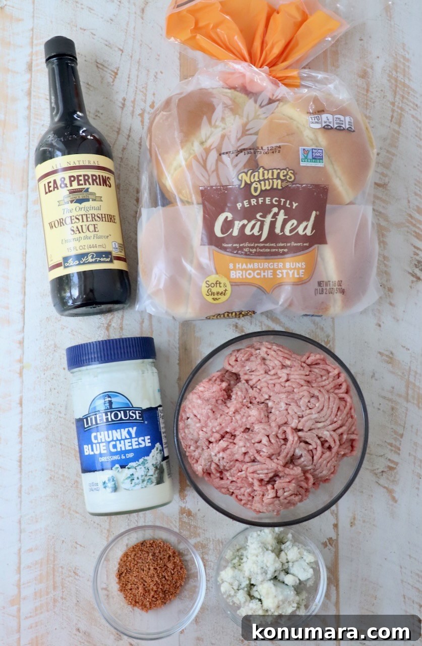Classic Blue Cheese Burger Recipe 5 ingredients for blue cheese burgers on white wood board