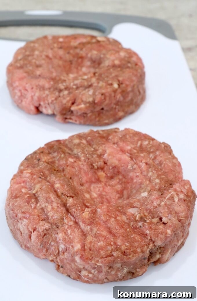 Classic Blue Cheese Burger Recipe 6 burger patties on cutting board