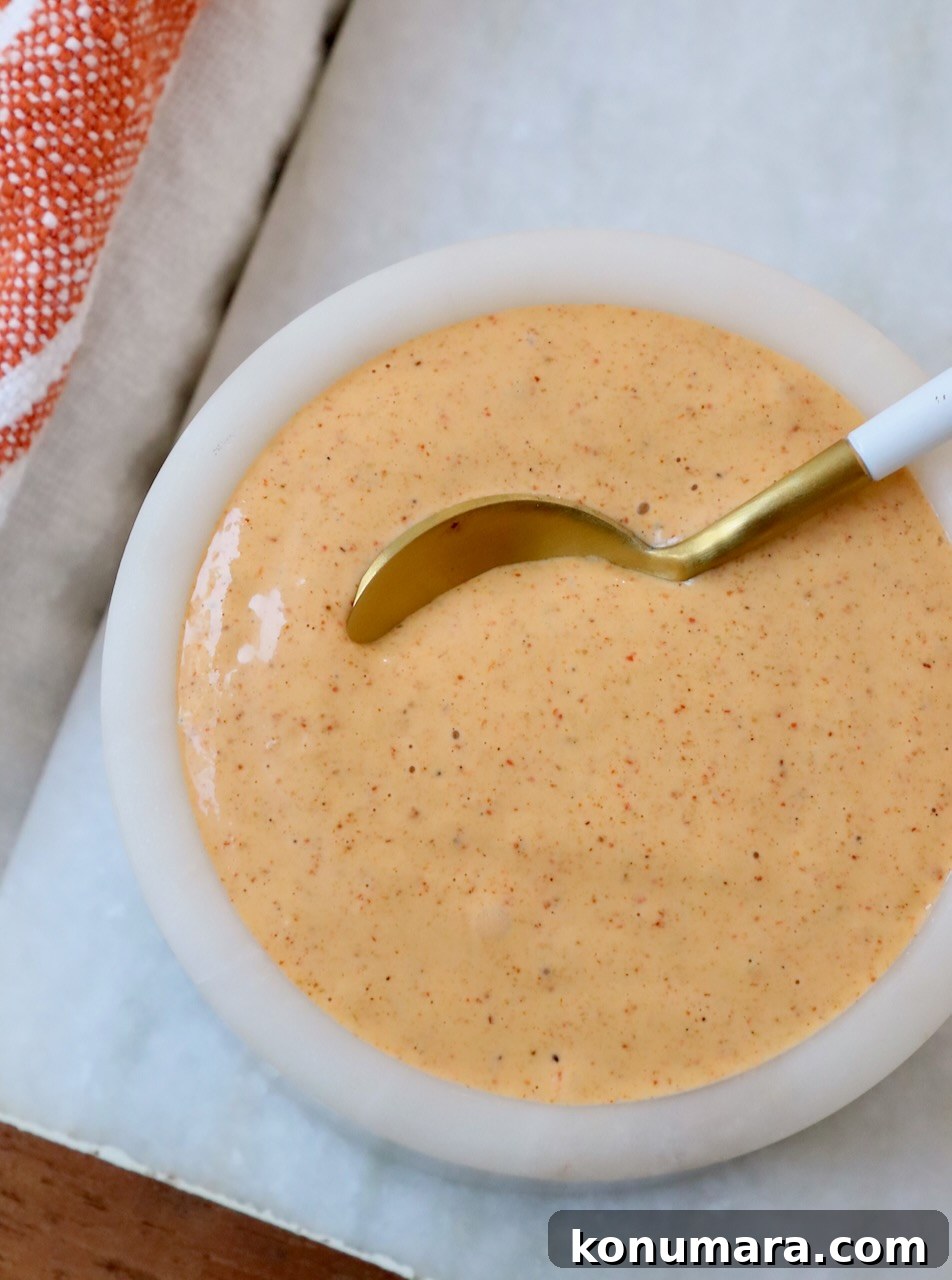 sauce in small bowl with spoon