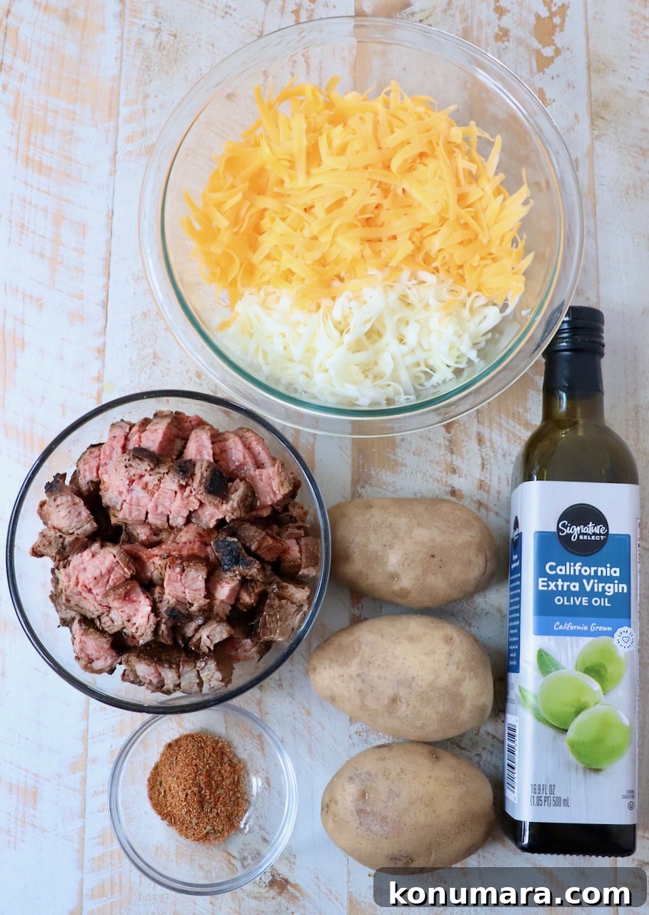 Carne Asada Fries Recipe: Crispy Fries with Grilled Steak 3 ingredients for carne asada fries on white wood board