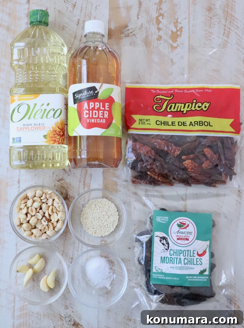 Salsa Macha: Mexican Chili Oil Recipe 3 ingredients for salsa macha on a white wood board