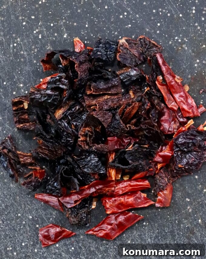 Salsa Macha: Mexican Chili Oil Recipe 4 chopped dried chilies on a cutting board