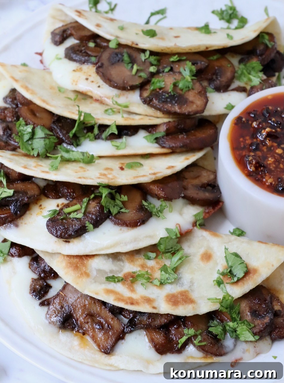 Flavorful Mushroom Tacos Recipe 7 Stacked mushroom tacos on a plate