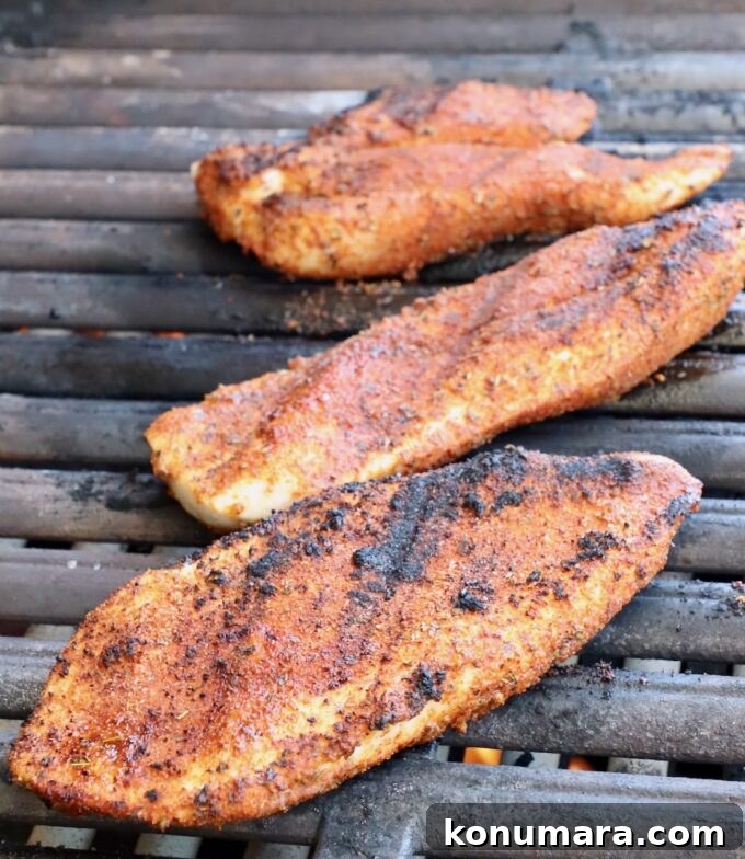 Crispy Chicken Quesadilla Recipe with Melty Cheese 4 seasoned grilled chicken on a grill