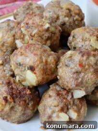 Crispy, Juicy Air Fryer Meatballs Recipe 16 air fried meatballs stacked up on a plate