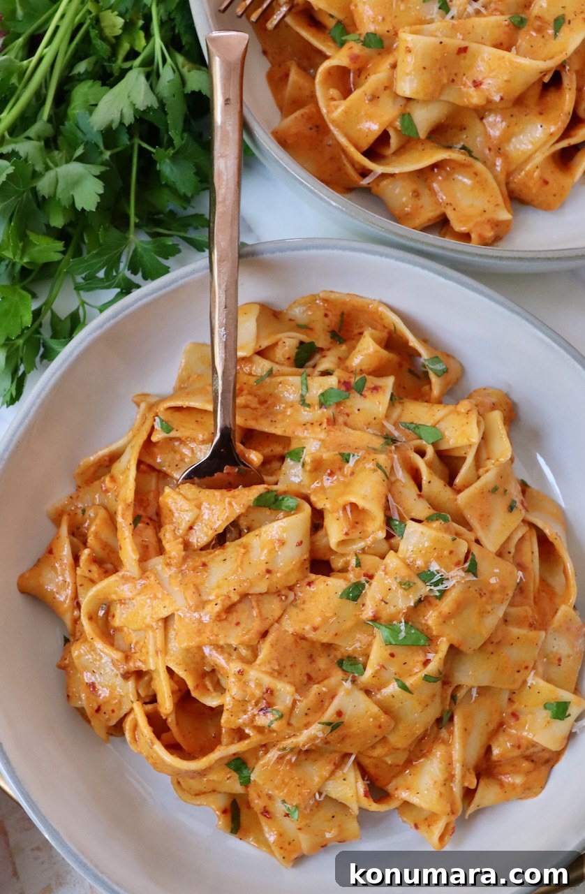 Spicy Nduja Pasta Recipe with Cherry Tomatoes 8 nduja pasta in bowl with fork