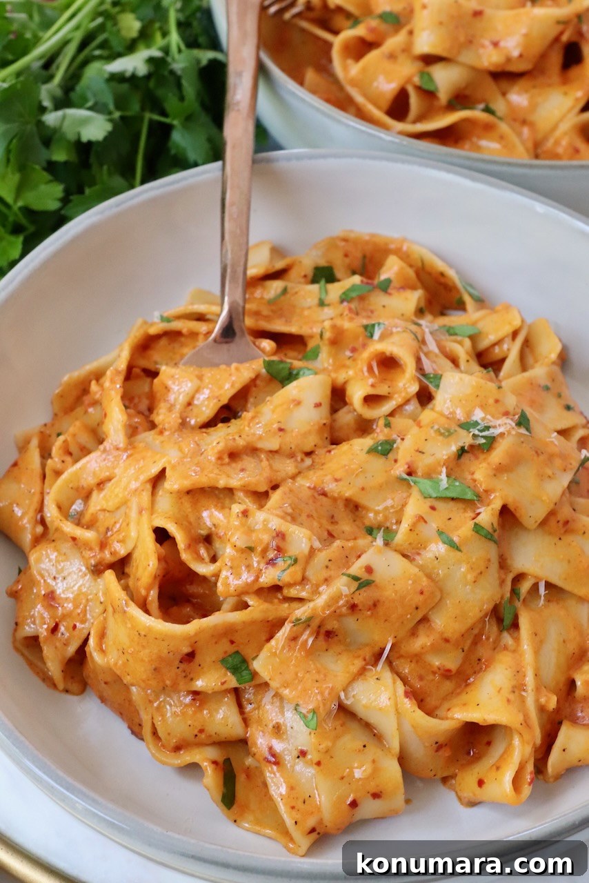 Spicy Nduja Pasta Recipe with Cherry Tomatoes 10 nduja pasta in bowl with fork
