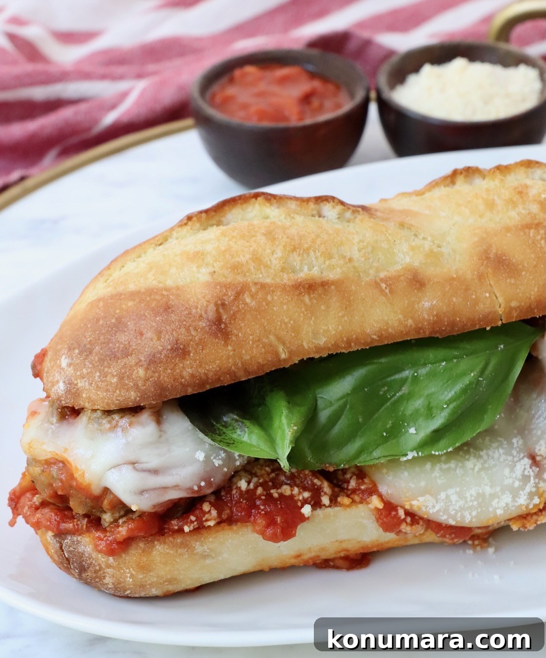 Classic Meatball Sub Recipe with Marinara and Mozzarella 2 meatball sub on plate