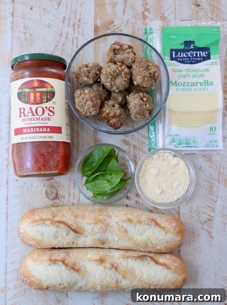 Classic Meatball Sub Recipe with Marinara and Mozzarella 3 ingredients for meatball subs on white wood board