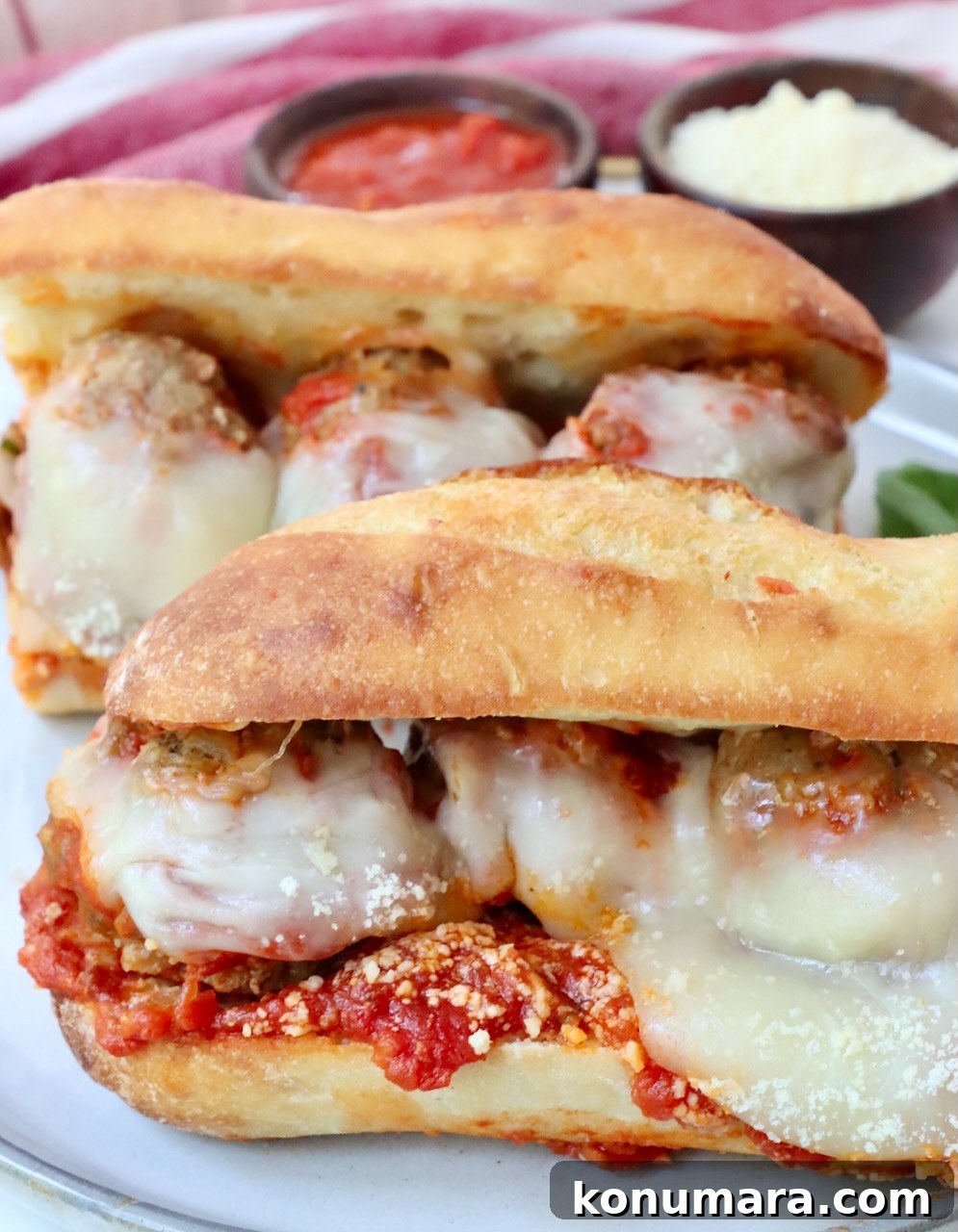 Classic Meatball Sub Recipe with Marinara and Mozzarella 10 meatball sub sandwiches on a plate