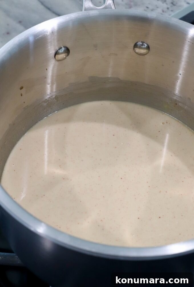 seasoned creamy sauce in a pot on the stove