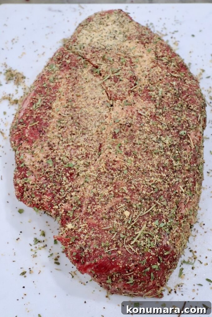 seasoned chuck roast on a cutting board