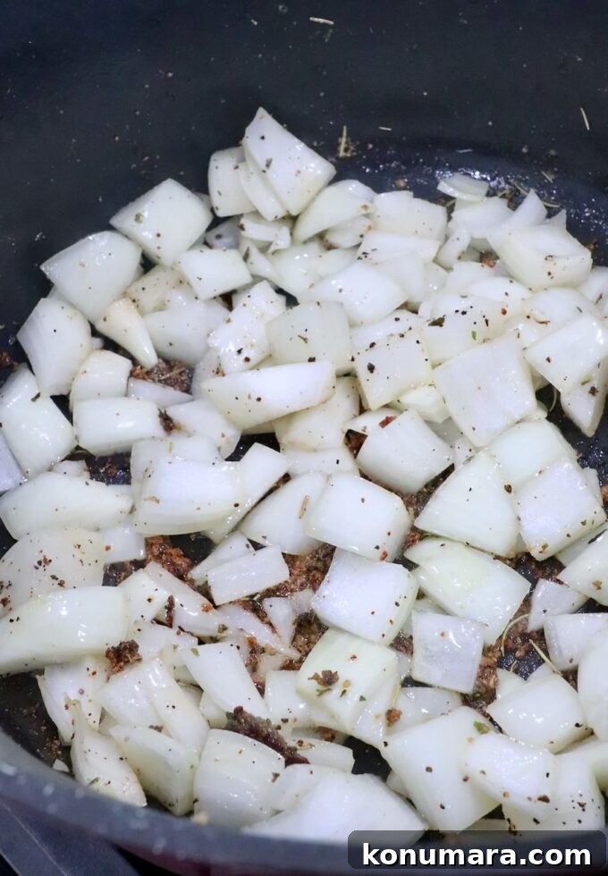large diced onions in a dutch oven